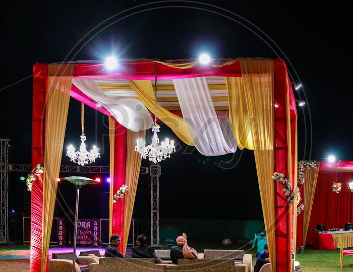 A Decorated Wedding Gazebo In India With Sofa Seating And Lighting