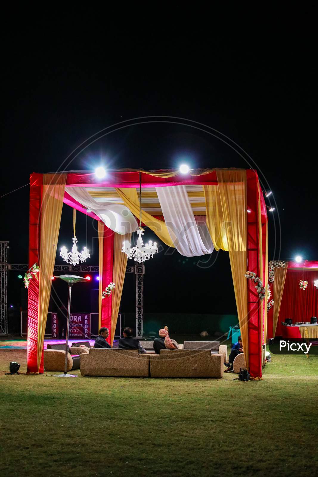 A Decorated Wedding Gazebo In India With Sofa Seating And Lighting