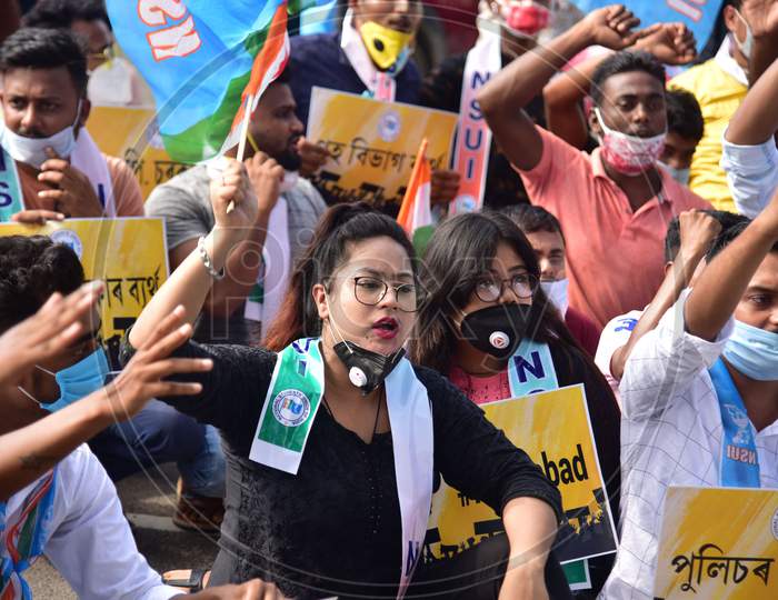 Activists of NSUI block National highway 37 during a protest against the alleged recruitment scam of Assam Police, demanding the arrest of BJP leaders and prime accused Diban Deka in Nagaon District of Assam on Seot 30,2020.