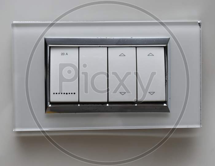 Designer Electrical Switch Board With Two Way Switches On Laminated Tile