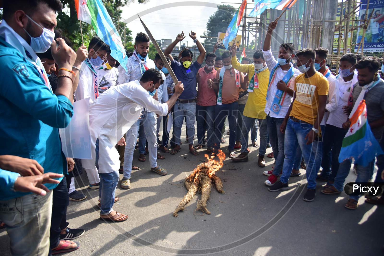 Activists of NSUI  burn effigy of Assam chief minister Sarbananda sonowal during a protest against the alleged recruitment scam of Assam Police, demanding the arrest of BJP leaders and prime accused Diban Deka in Nagaon District of Assam on Seot 30,2020
