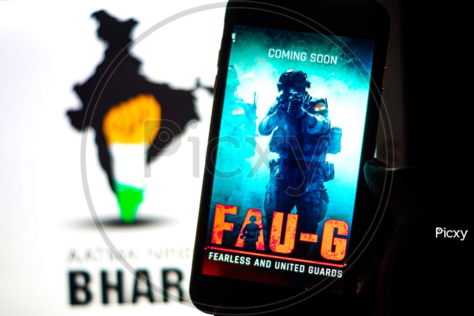 FAUG Game on Mobilephone or Smartphone Screen with Indian Map in the Background