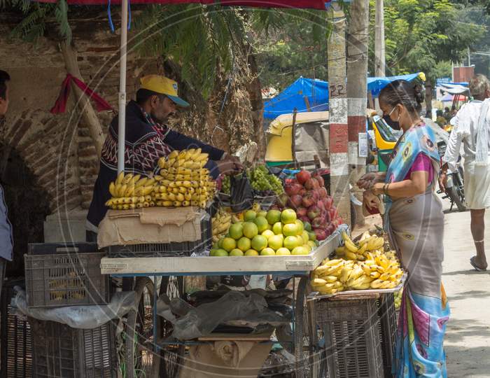A Street Fruit Vendor seen doing his daily chores in Srirangapatna/Karnataka/India.