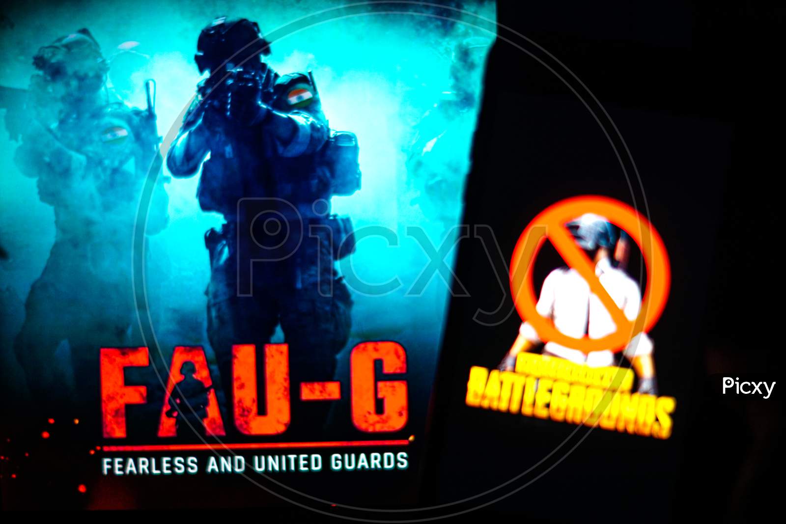 Selective Focus on FAUG Game with Banned PUBG on Mobilephone or Smartphone Screen Game in the Foreground