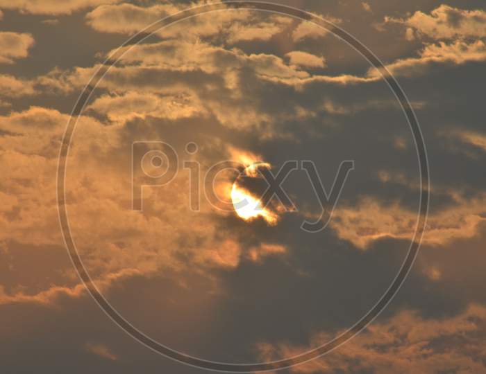Sun hidden behind the clouds, photography