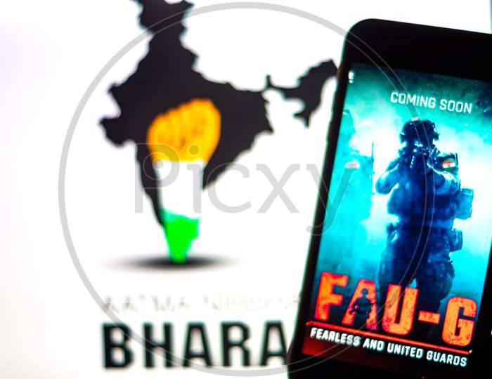 FAUG Game on Mobilephone or Smartphone Screen with Indian Map and 
AatmaNirbhar Bharat Text in the Background