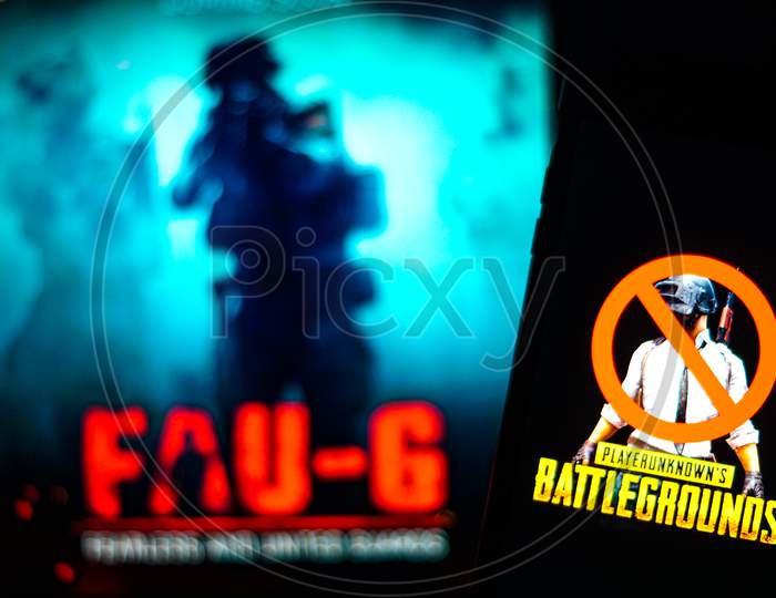 Selective Focus on Banned PUBG on Mobilephone or Smartphone Screen Game with FAUG Game in the background