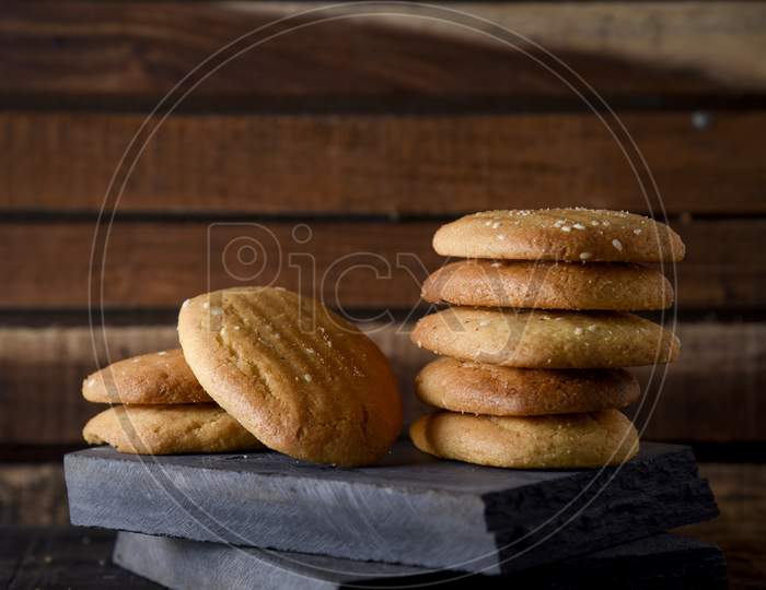 Biscuits Isolated On Dark Background. Atta Biscuit, Cookies, White Flour Biscuit - Indian Cooking