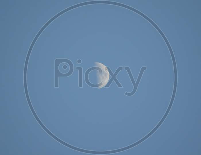 Moon with blue sky photography