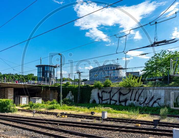 Germany, Heritage Site Mainz, A Train On A Train Track Near A Fence