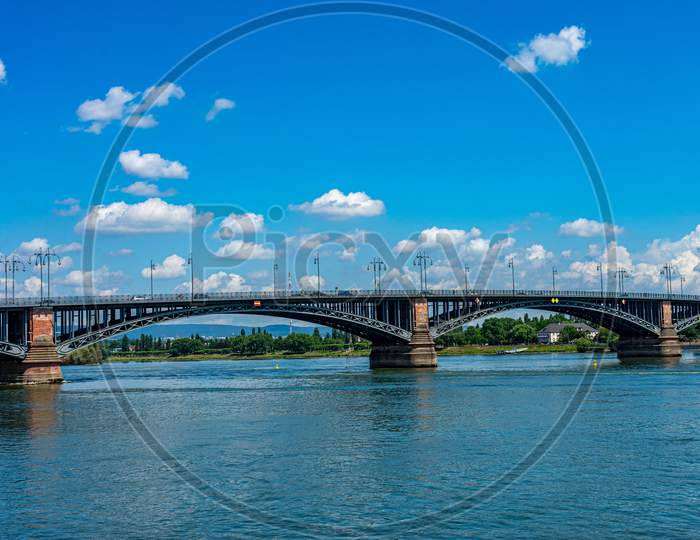 Germany, Heritage Site Mainz, London Bridge, A Train Crossing London Bridge Over A Body Of Water