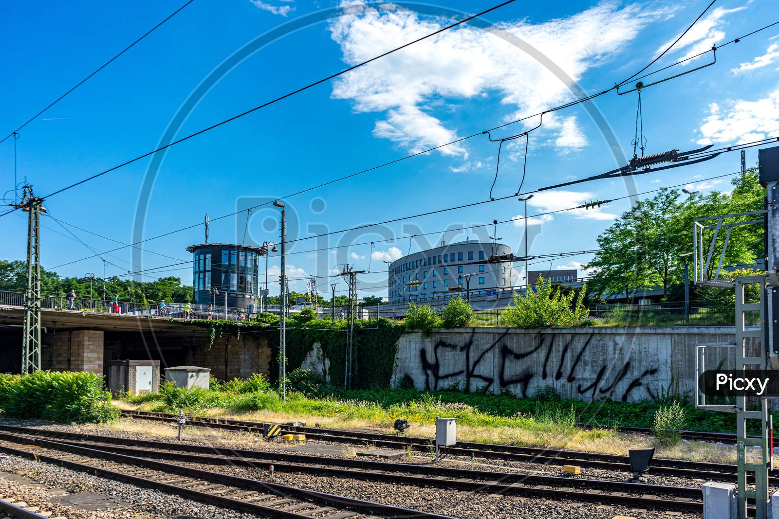 Germany, Heritage Site Mainz, A Train On A Train Track Near A Fence