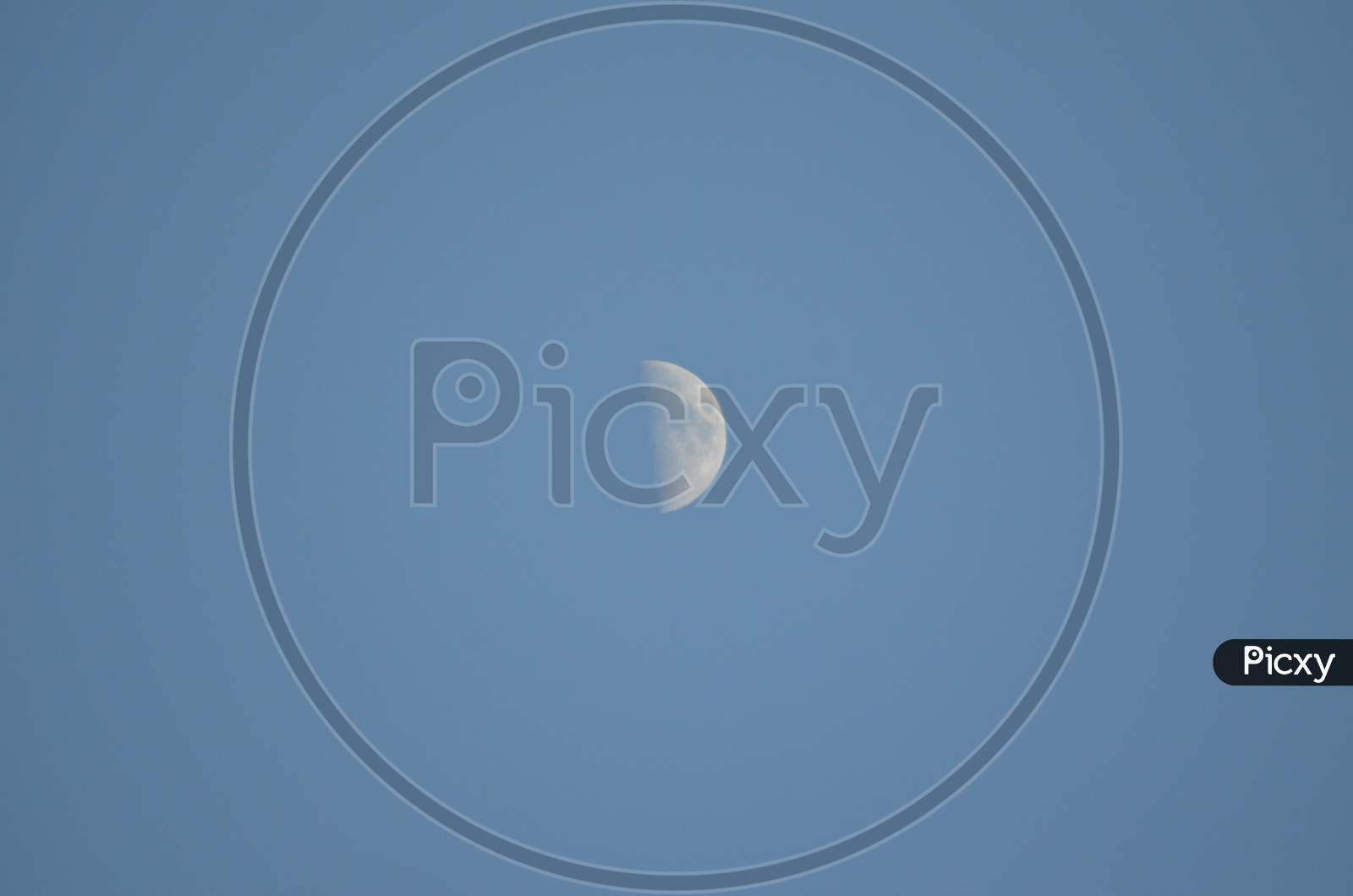 Moon with blue sky photography