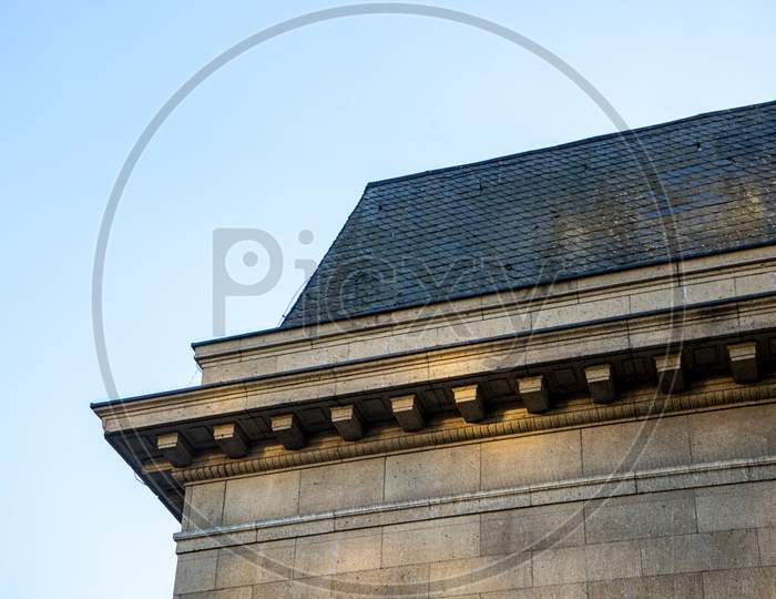 Germany, Frankfurt, A Clock Tower In Front Of A Building