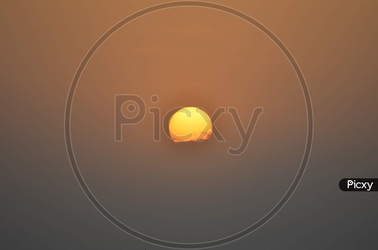 Beautiful sun photography with yellow and gray sky