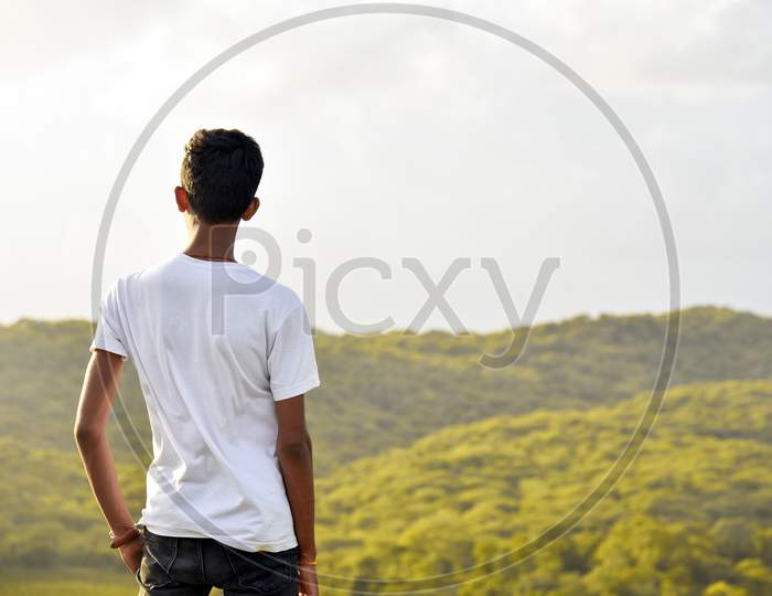 Man Standing On Top Of Mountain. Beautiful Landscape.