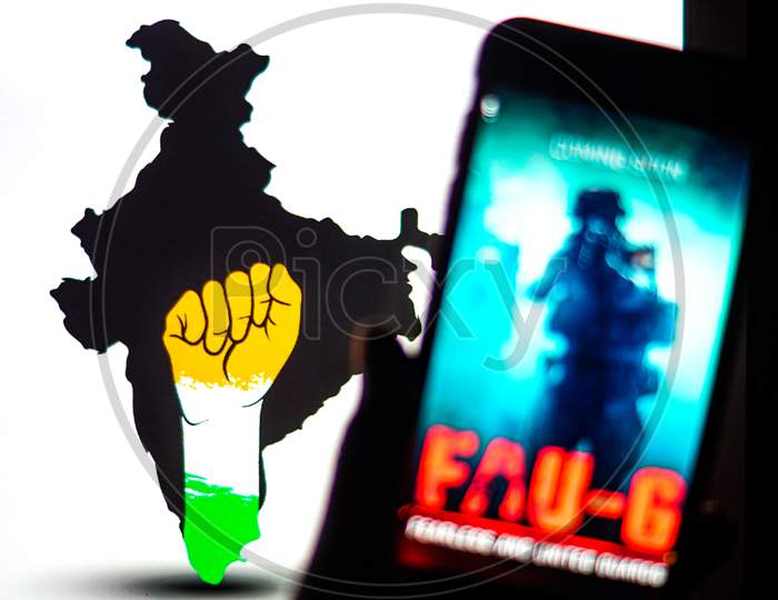 FAUG Game on Mobilephone or Smartphone Screen with Indian Map in the Background