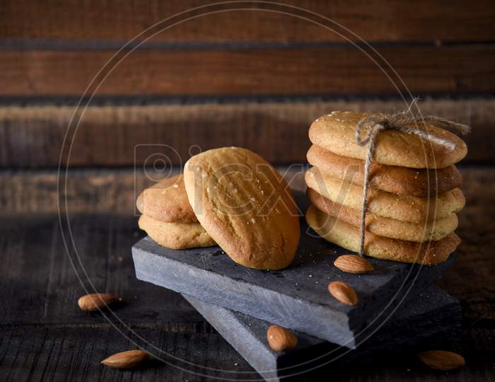 Biscuits Isolated On Dark Background.Atta Biscuit, Cookies, White Flour Biscuit - Indian Cooking