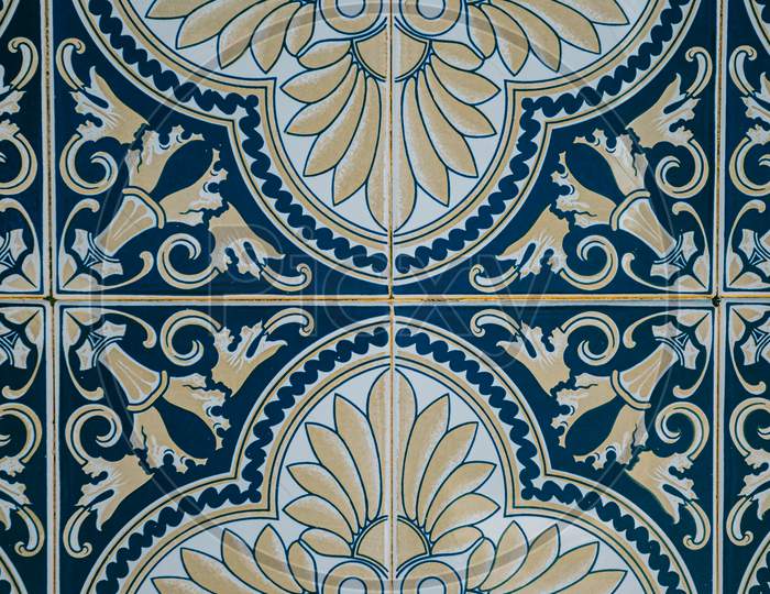 Background Made Of A Portuguese Tiles With A Mosaic In It