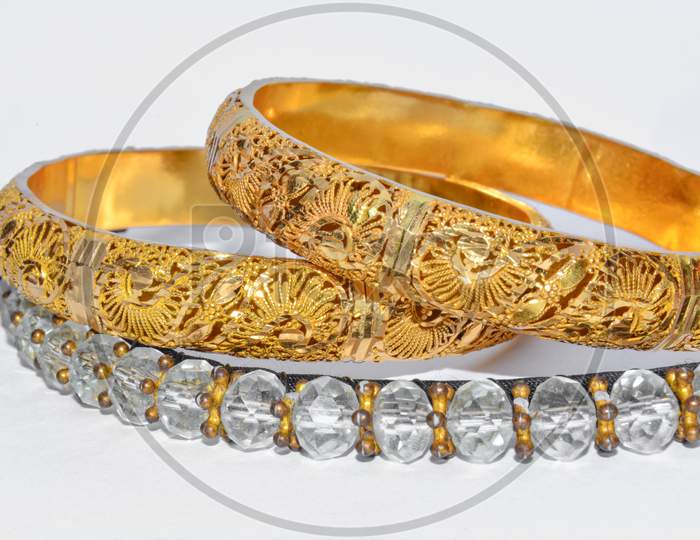 Gold bangles islolated on white background