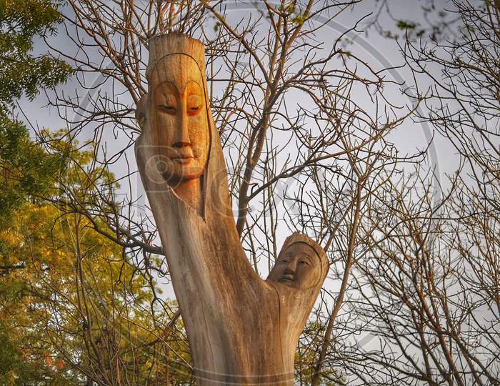 Wood carving on a tree