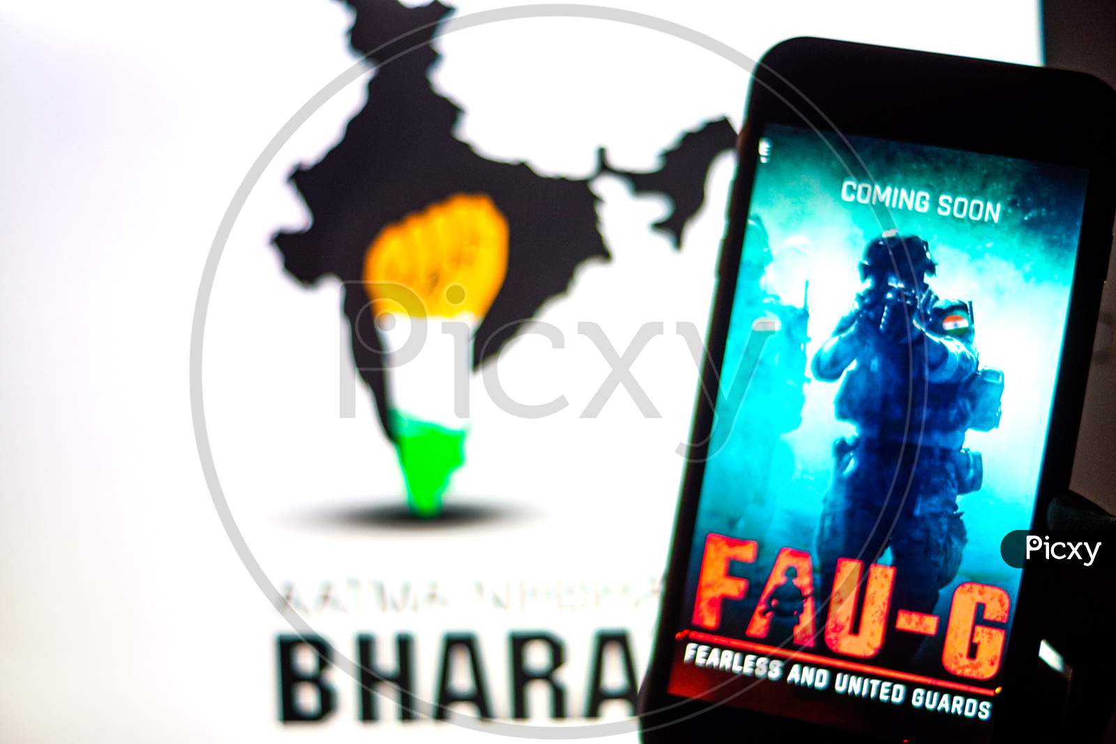 FAUG Game on Mobilephone or Smartphone Screen with Indian Map and 
AatmaNirbhar Bharat Text in the Background