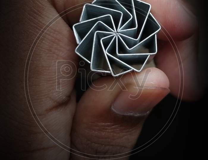 Illustration of pin in hexagon shape , hold in hand