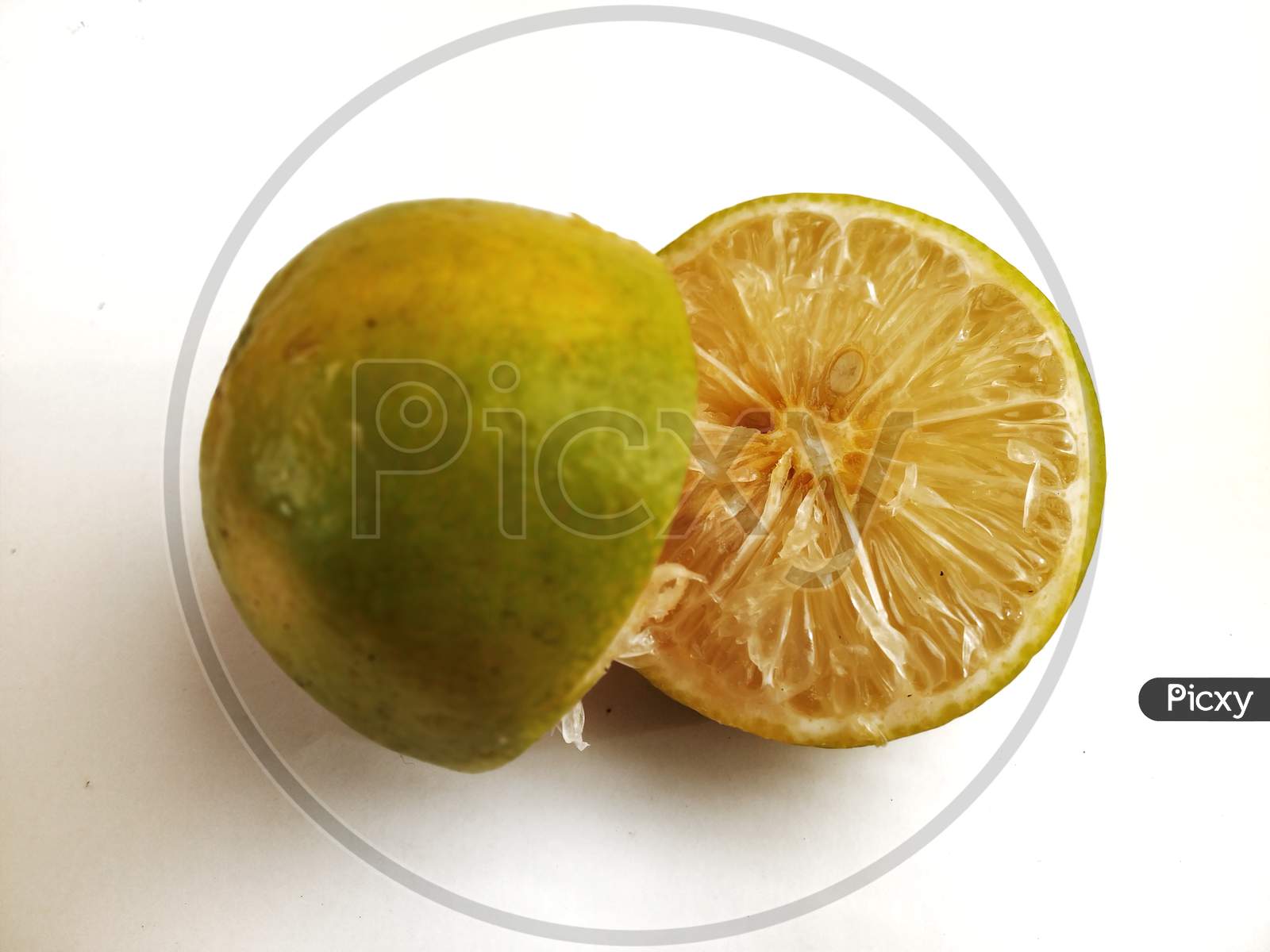 Photo Of Two Piece Of Mosambi, Also Known As Sweet Lemon