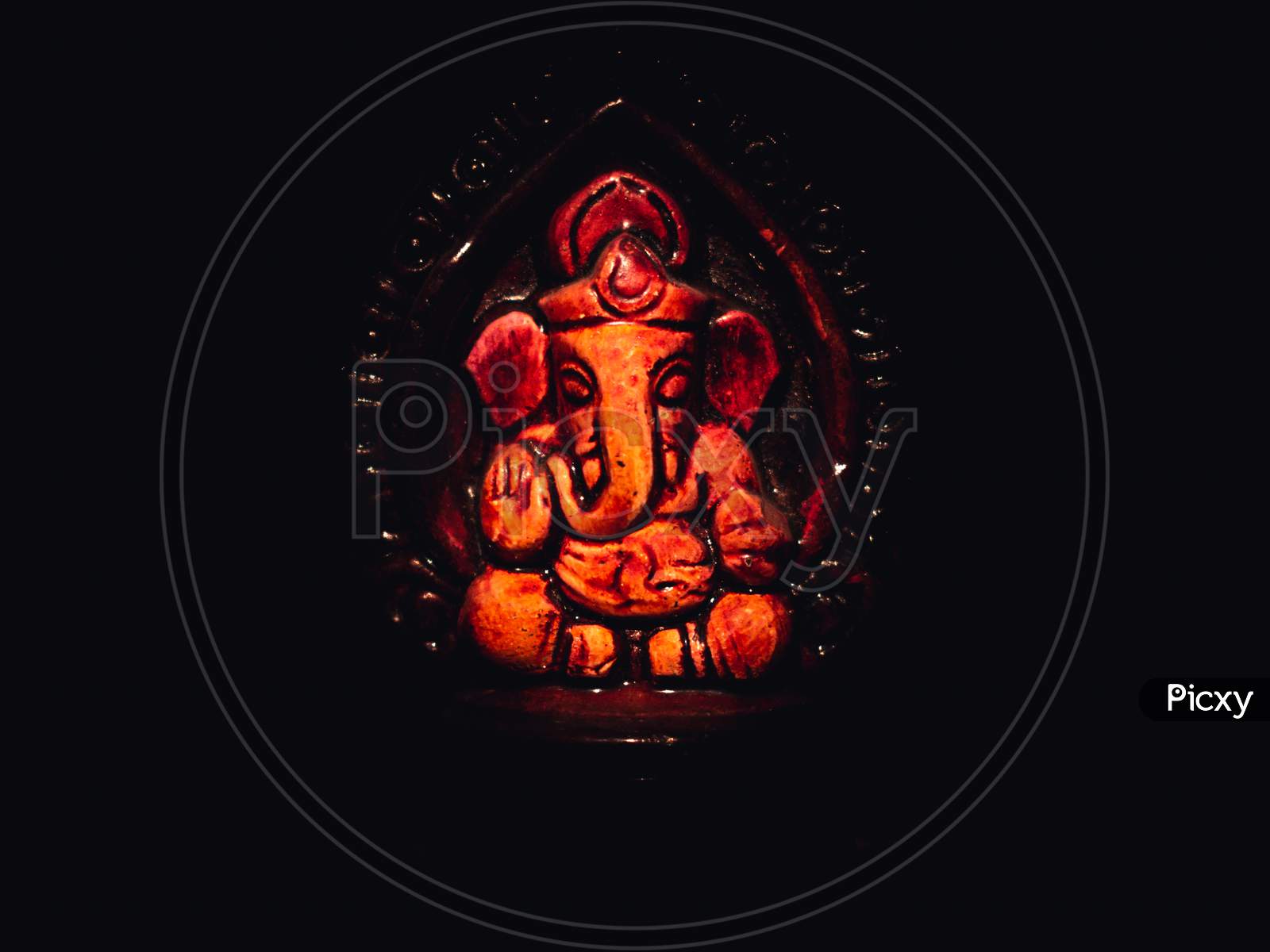 God lord Ganesha in red color texture with black background