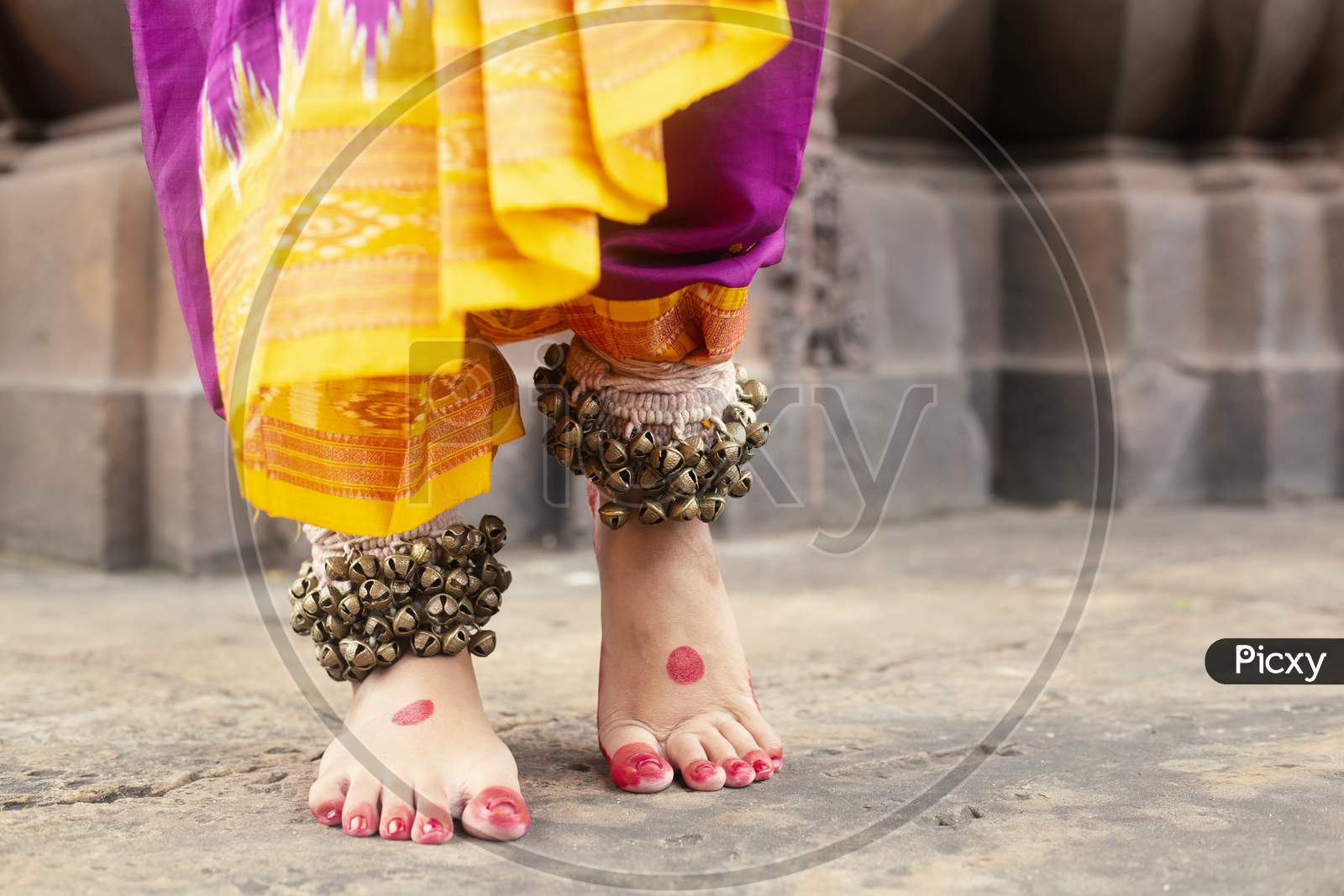 Indian Traditional Odissi dance. Indian classical odissi dance form in feet with musical anklet with selective focus.