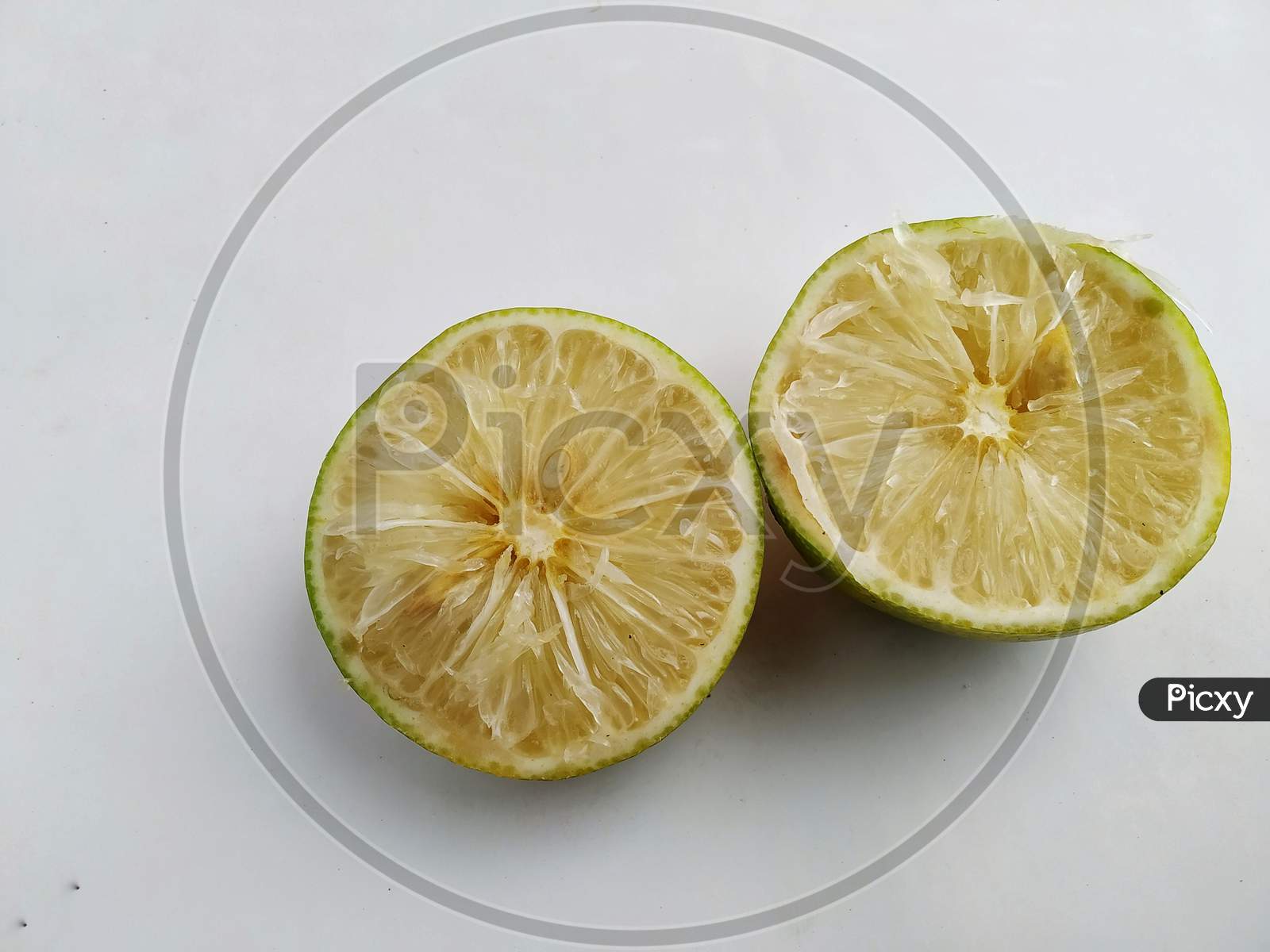 Photo Of Two Piece Of Mosambi, Also Known As Sweet Lemon