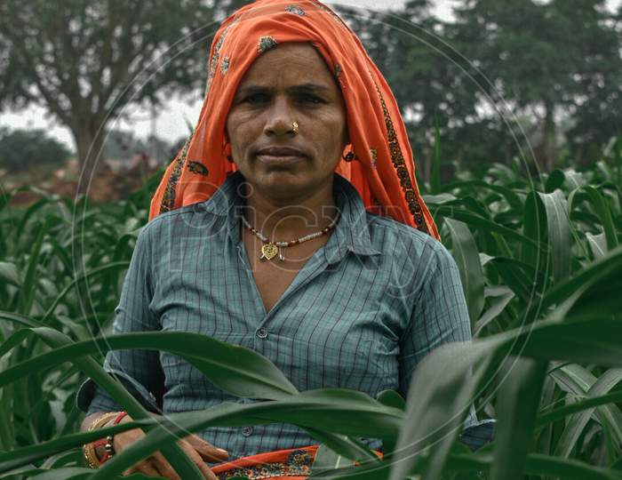 Woman standing in a field, Farmer,