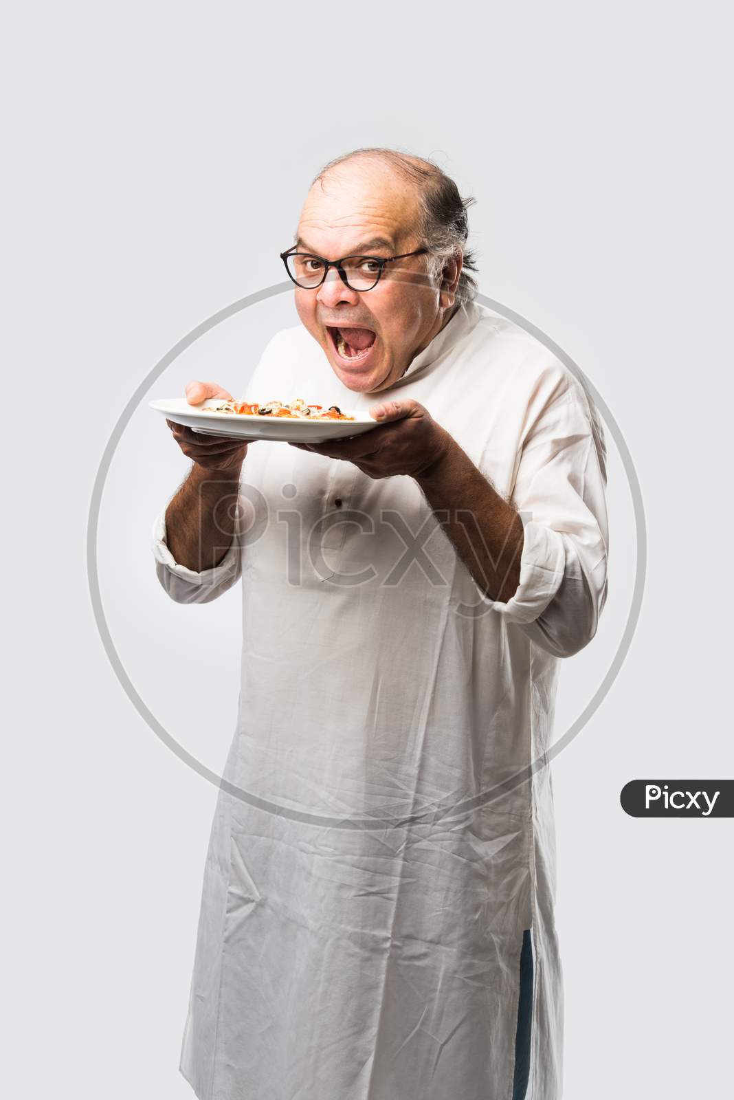 Asian Indian Old Man Eating Pizza With Funny Expressions