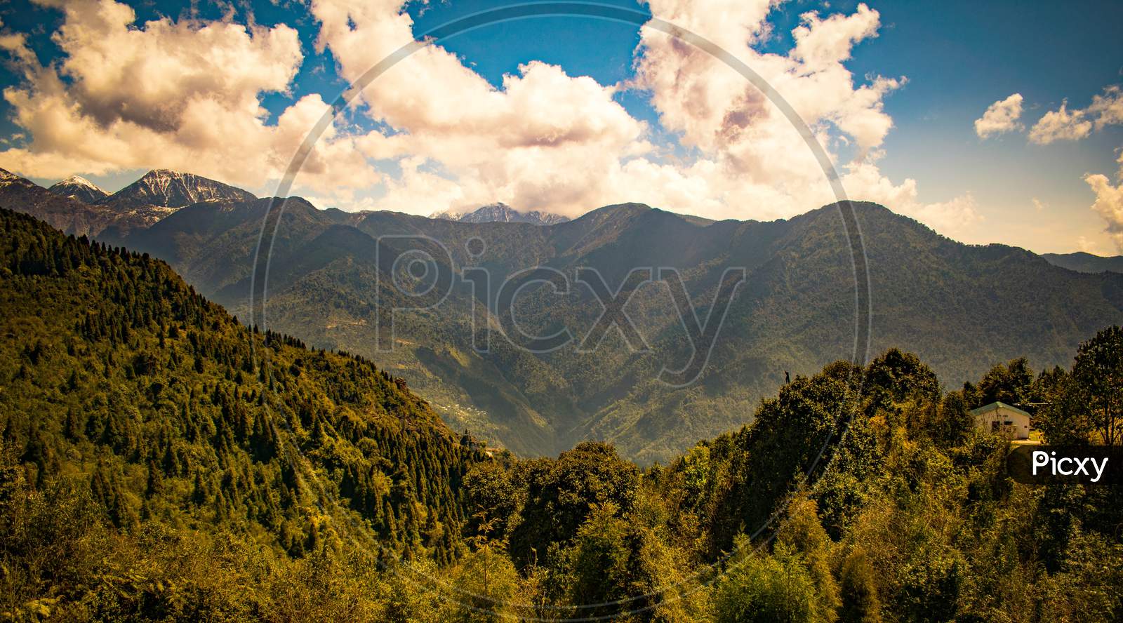 Sikkim valley landscape with clouds near hanuman temple