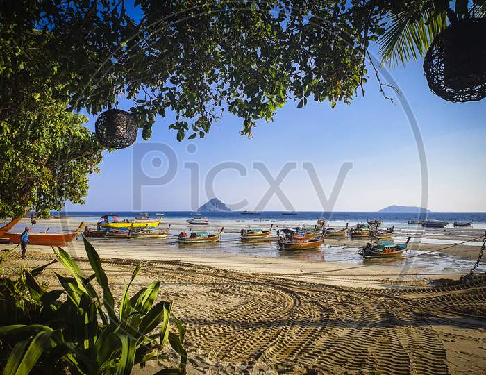 Phi Phi Island,Thailand,Tropical Beach With Anchored Boats.