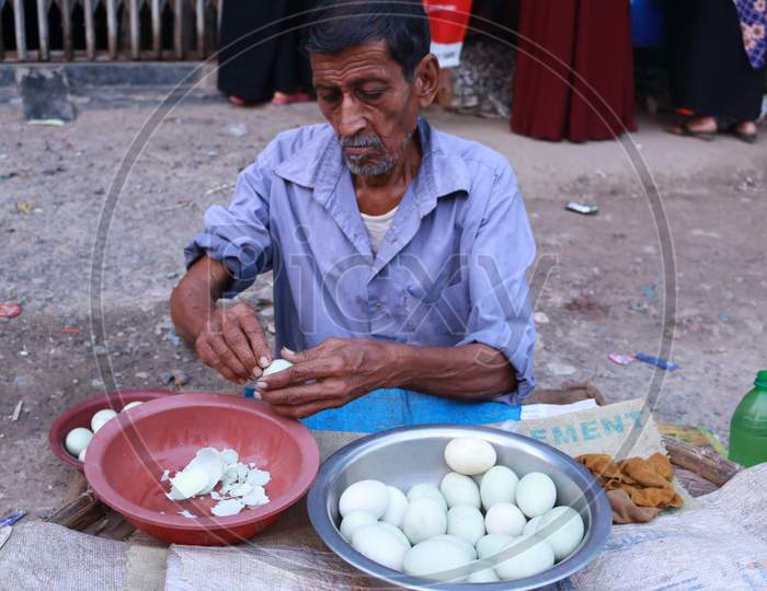 A man selling eggs