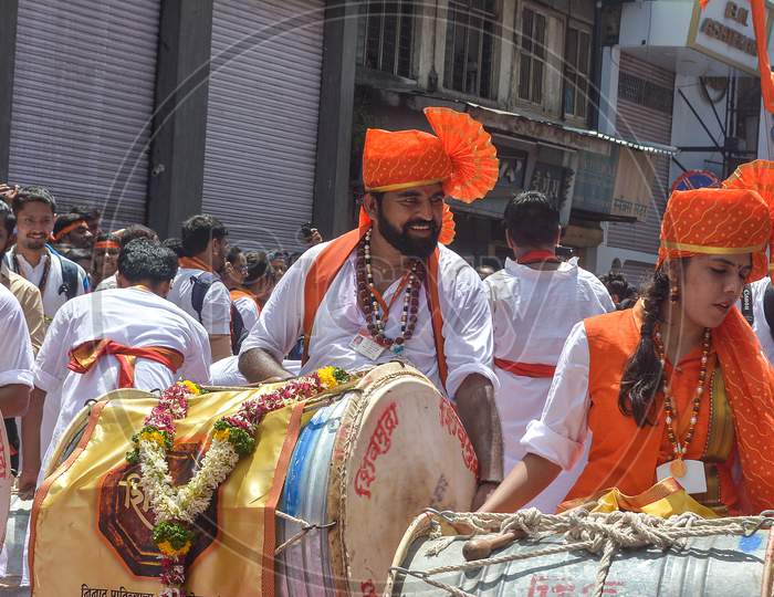 Pune, India - September 4, 2017: Shivmudra Dhol Tasha Pathak Playing Dhol / Drum On The Streets Of Pune On The Occasion Of Ganpati Visarjan Festival / Anant Chaturdashi Festival Celebration In Pune.