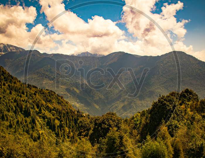 Sikkim valley landscape with clouds near hanuman temple