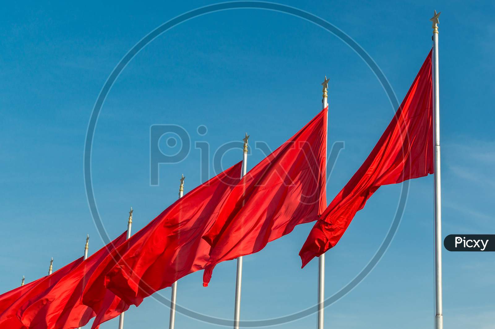 Red Banners Unfurled In The Wind At Tiananmen Square In Beijing, China