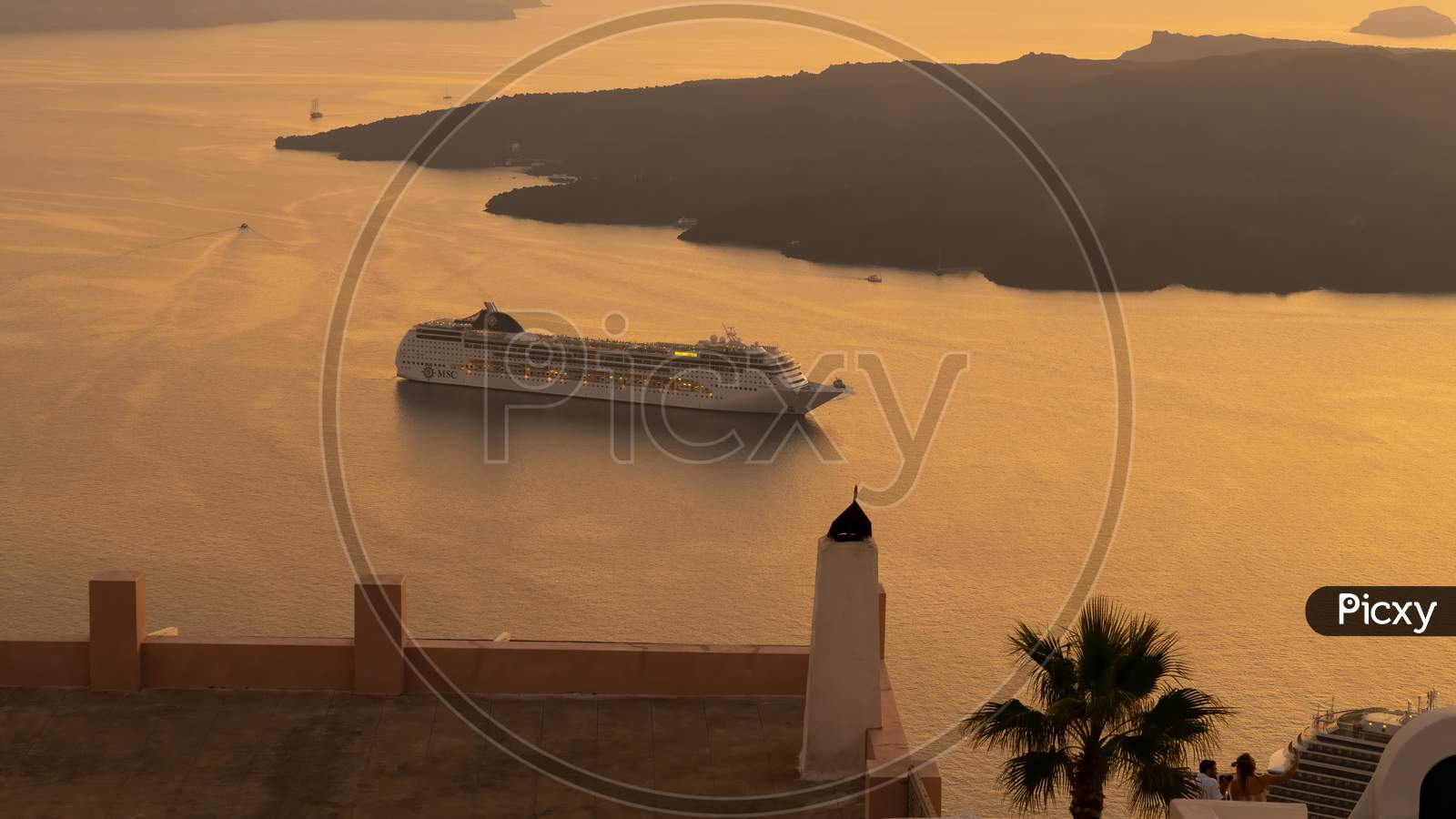 Cruise Ship At Anchor During Sunset