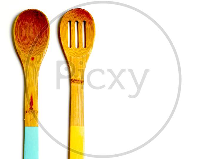 Wooden Spoons On A White Background. Gastronomy Concept.