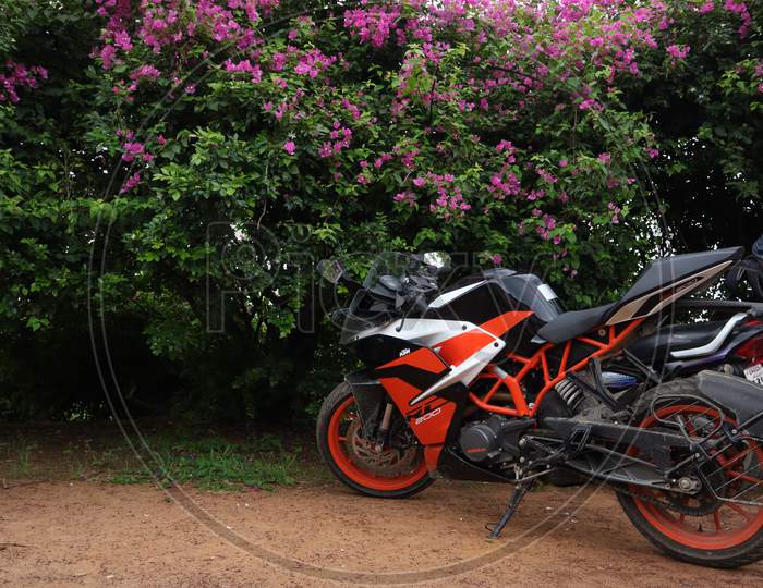 Duke bike with flower background