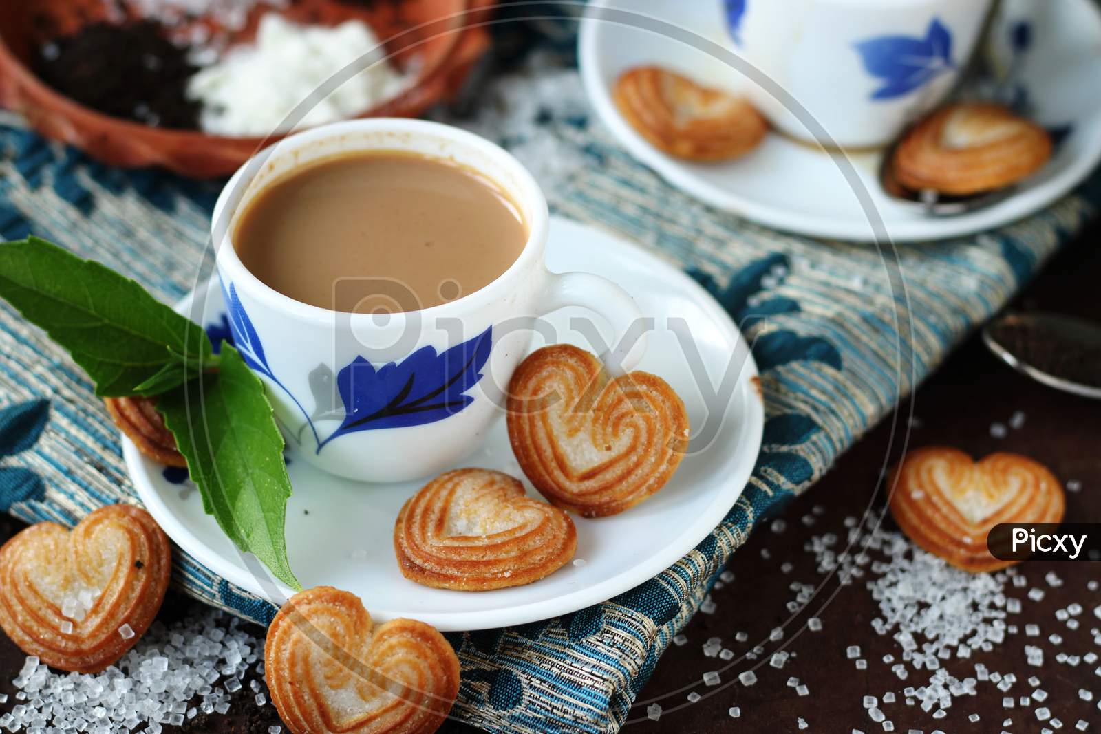 beautiful cup of tea with cookies
