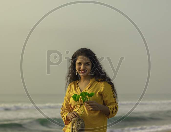 Gold Portrait Of Hindu Young Woman At Chennai Beach