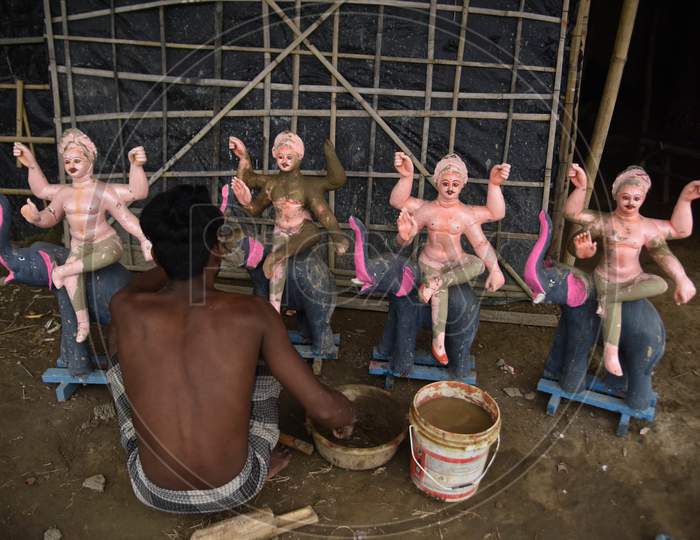 An Artist Is Sculpting The Vishwakarma Idols With Clay Ahead Of Vishwakarma Puja In Nagaon District Of Assam On Sep 07,2020.