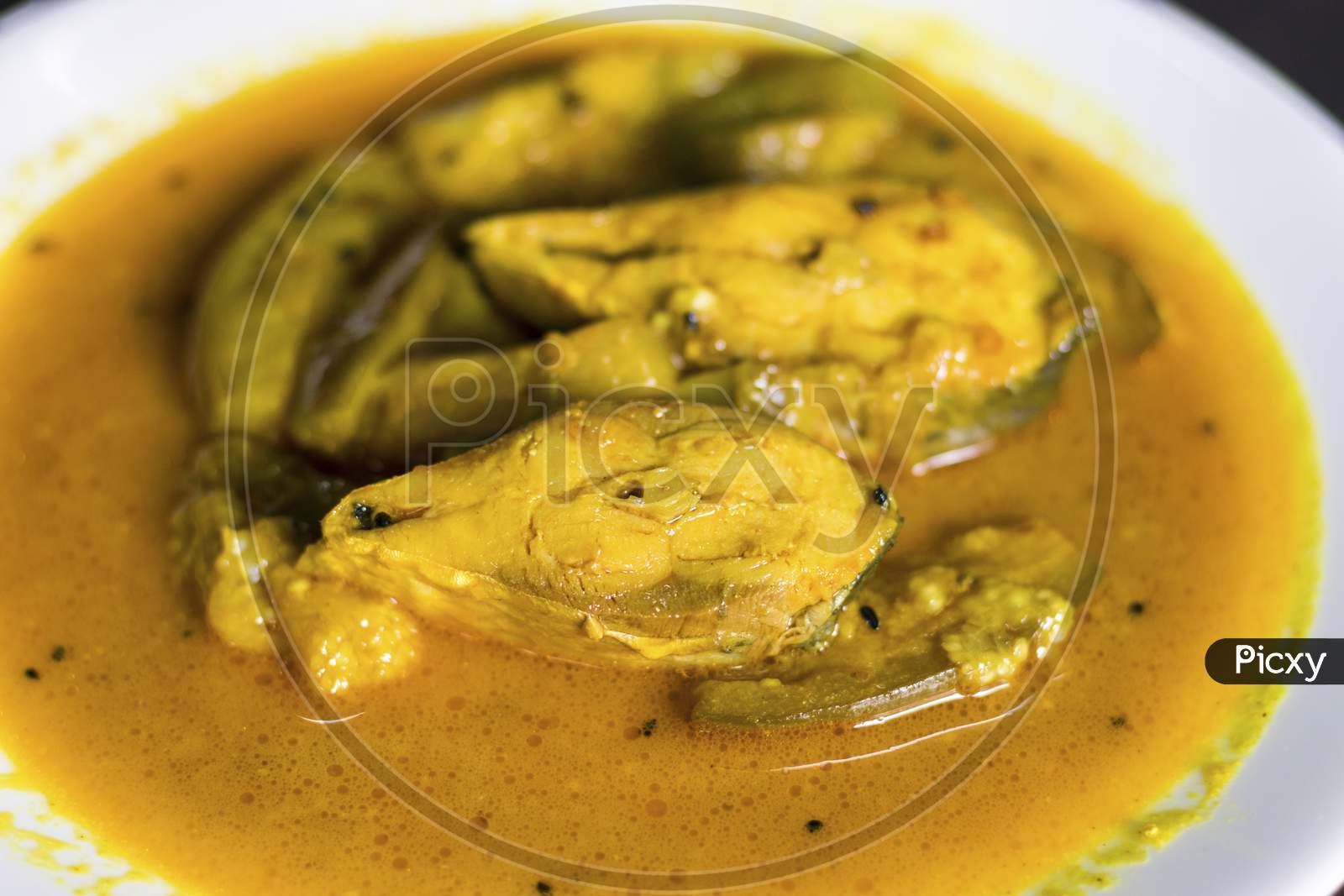 famous Bengali dish hilsha/Ilish with brinjal/Eggplant recipe.