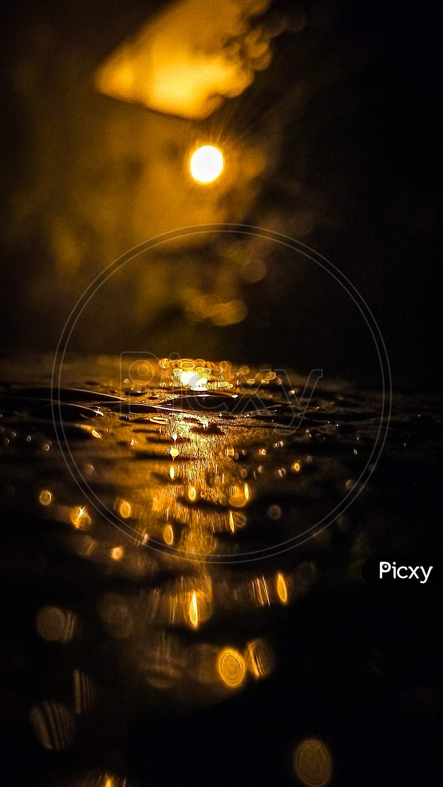 Image of Rain drops Photography by Sam Belieber-YZ944861-Picxy