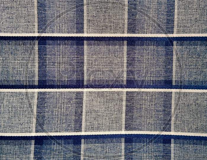 Close-up shot of woven fabric shirt.