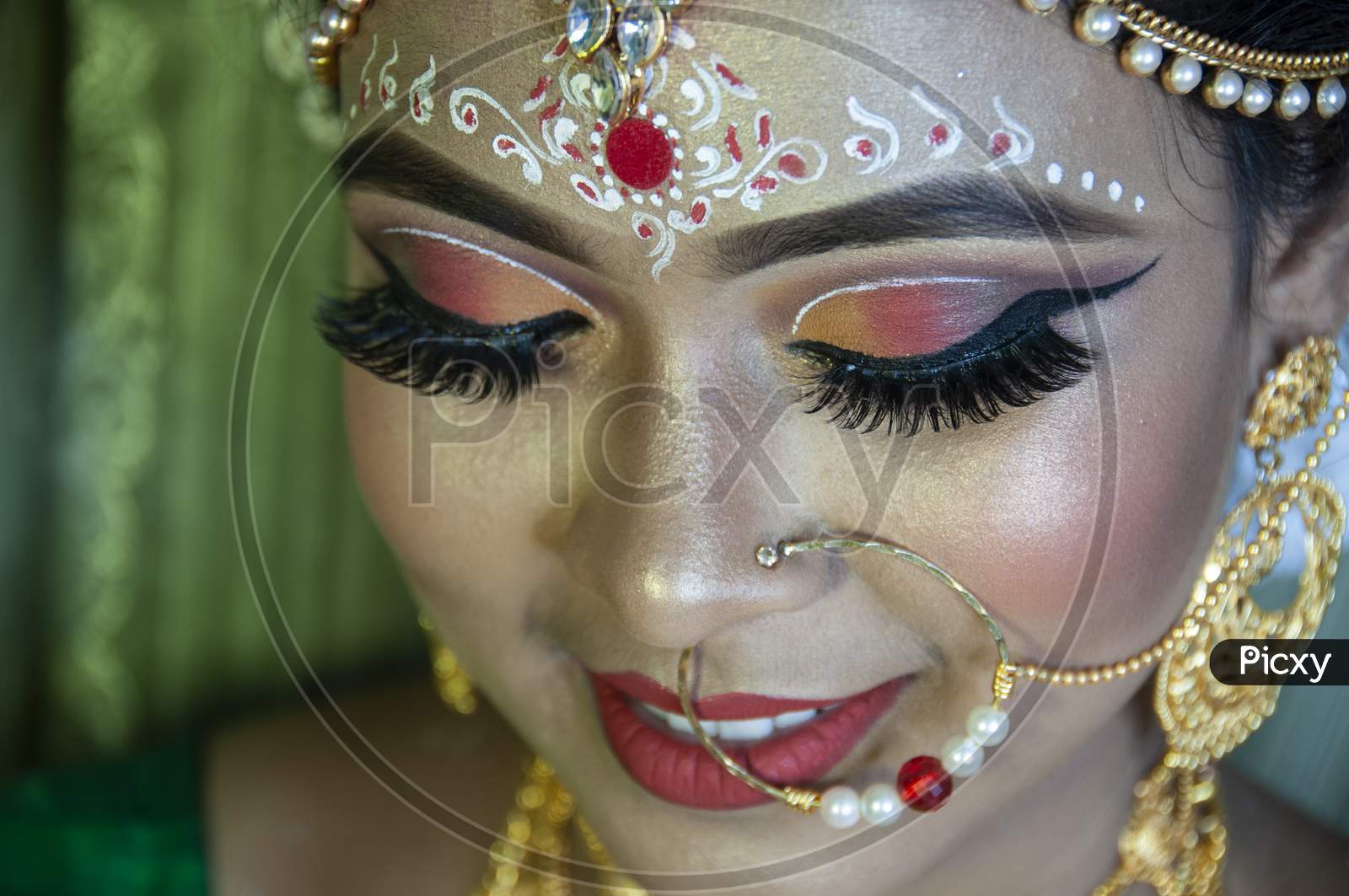 Image of A Girl In Her Marriage Day Showing Her Eye Makeup ...