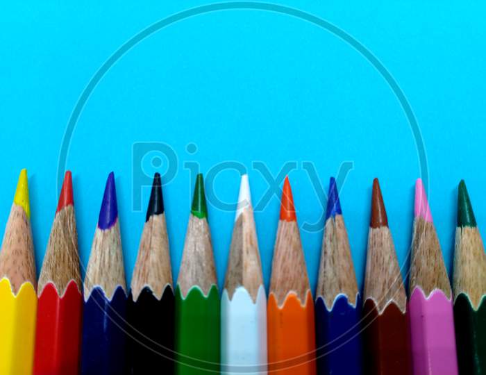 Colour Pencil With Blue Background,Pencil Sketch